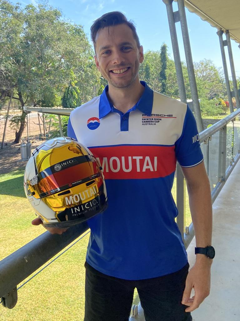 Race driver Luke King with his new helmet in Darwin ready for the Porsche Carrera Cup. Picture: Max Hatzoglou