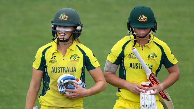 Australian cricketers Ellyse Perry and Meg Lanning share a joke as they leave the field after the ICC Women's World Cup 2017 match between Australia and India. (Pic: Stu Forster/Getty)