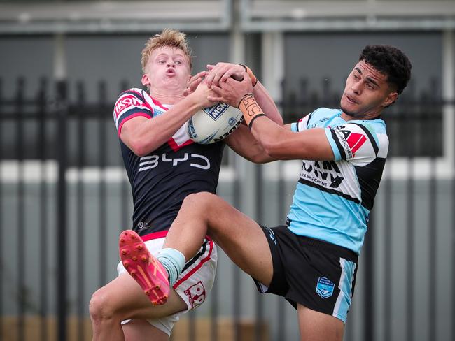 Baxter Warner &amp; Elijah Paea contest the football. Picture: Adam Wrightson Photography