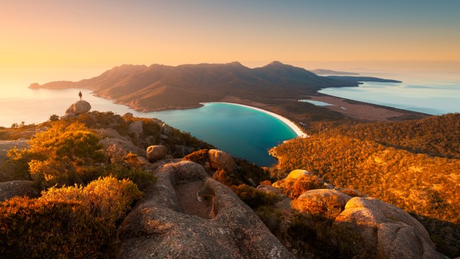 Pink mountains, blue sea: East Coast, TASThere’s no doubt Freycinet’s pink granite mountains and glowing white beaches are a treat to explore on foot, but from a helicopter you can really appreciate the full extent of this magnificent peninsula, all the way down to Schouten Island (keep an eye out for seals, dolphins and whales). The Tasmanian Air Tours flight takes in the five peaks of The Hazards and renowned Wineglass Bay, as well as views over surrounding Swansea and beyond to the forested Eastern Tiers.tasmanianairtours.com.au