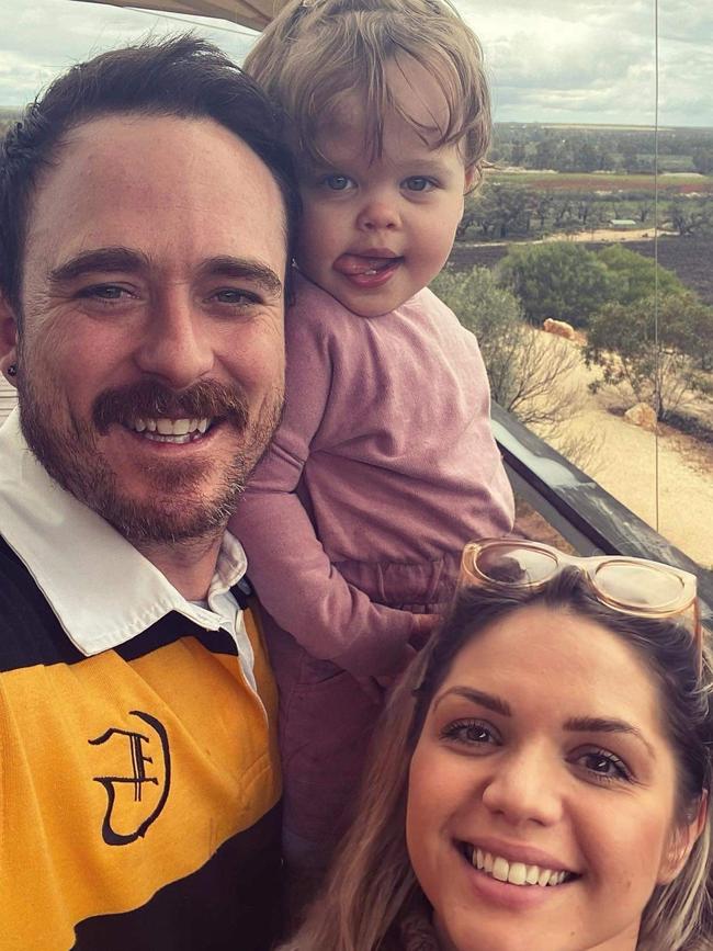 Sarah Lloyde with husband Tim Day and daughter Nola Picture: Supplied