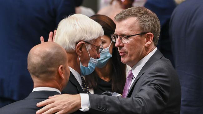 Alan Tudge MP, congratulates Treasurer Josh Frydenberg on delivering the budget in the House of Representatives at Parliament House on March 29, 2022 in Canberra, Australia. (Photo by Martin Ollman/Getty Images)