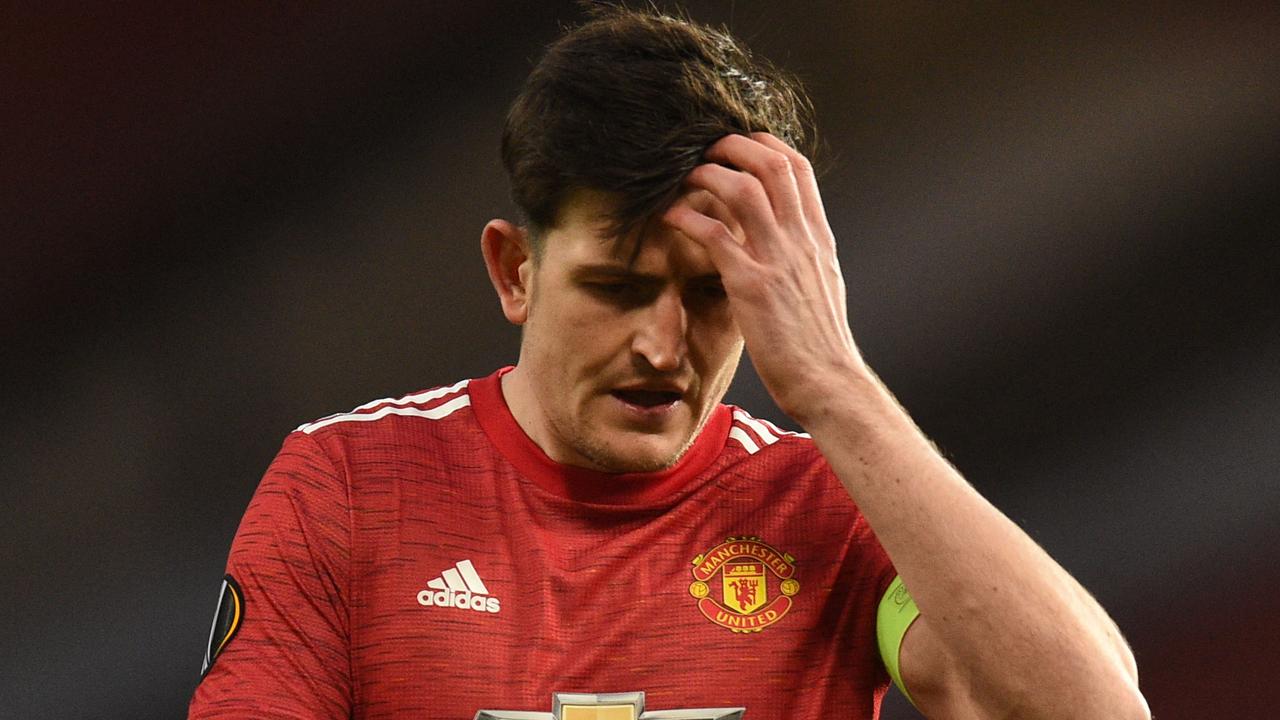 Harry Maguire rued a big miss. (Photo by Oli SCARFF / AFP)