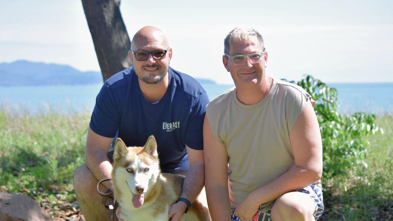 Regional NSW couple Daniel Loader and Martin Geyer were reunited with stolen dog Nova after a 22 hour journey to Townsville. Picture: Holly Fishlock.