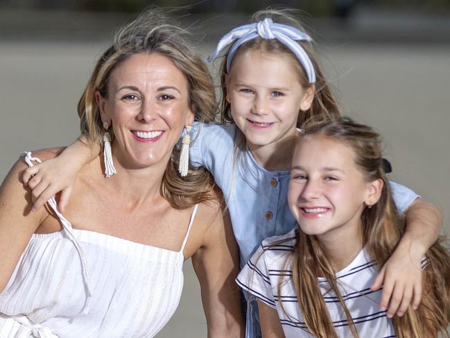 Single mother Freya Cutelli and her two daughters Coco, 11, and Lulu, 7, recently switched health insurers which has saved them $65 per month. Images of the three of them on the beach please looking happy because they have saved money, story is about how to save on health insurance. Picture: Sarah Matray