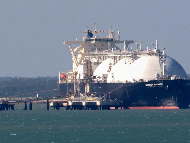 A liquefied natural gas (LNG) tanker operated by Energy Advance Co., a unit of Tokyo Gas Co., is moored at ConocoPhillips' LNG facilities in Darwin, Australia, on Wednesday, April 11, 2012. Darwin is in the express lane of Australia's two-speed economy -- a division the Reserve Bank of Australia used to separate resource-rich regions in the north that are powering growth and sucking in workers, from the tourism, manufacturing and retailer industries of the southeast that are teetering under a currency that has risen 65 percent in 3 1/2 years. Photographer: Sergio Dionisio/Bloomberg via Getty Images