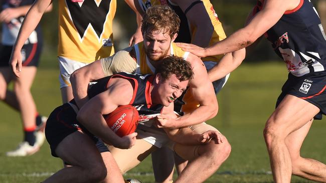 Daniel Nielson tackles Edward Morris. Picture: Chris Eastman