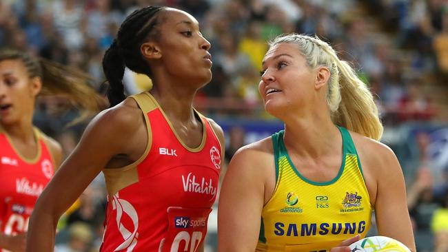 Australia’s Gretel Tippett takes control of the ball under pressure from England’s Layla Guscoth on Tuesday night. Picture: Getty Images