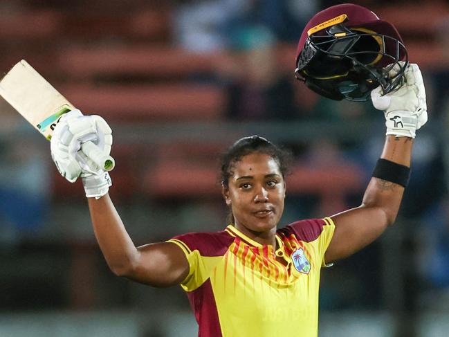 Hayley Matthews of the West Indies reacts after reaching her century during the T20 international women cricket match against Australia at the North Sydney Oval in Sydney on October 2, 2023. (Photo by DAVID GRAY / AFP) / -- IMAGE RESTRICTED TO EDITORIAL USE - STRICTLY NO COMMERCIAL USE --