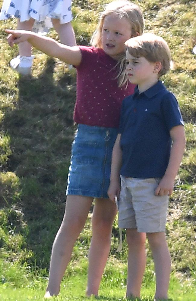 Savannah and Prince George were getting on well until she pushed him down a hill. Picture: James Whatling/Mega