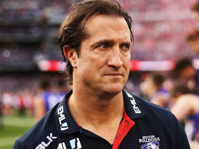 MELBOURNE, AUSTRALIA - OCTOBER 01: Luke Beveridge, Coach of the Bulldogs, celebrates after the 2016 Toyota AFL Grand Final match between the Sydney Swans and the Western Bulldogs at the Melbourne Cricket Ground on October 01, 2016 in Melbourne, Australia. (Photo by Ryan Pierse/AFL Media/Getty Images)