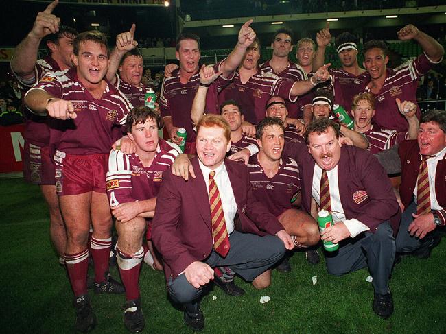 Jubilant Queensland State of Origin RL team with coach Paul "Fatty" Vautin after winning second game at MCG and the 1995 series. Sport / Rugby League / Teams