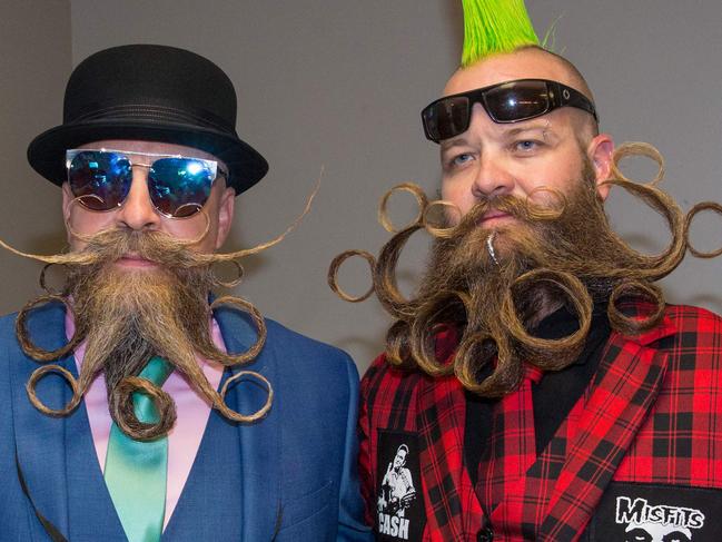 Competitors James McMahon (L) and John Banks attend the 2017 Remington Beard Boss World Beard & Moustache Championships held at the Long Center for the Performing Arts on September 3, 2017 in Austin, Texas. / AFP PHOTO / SUZANNE CORDEIRO