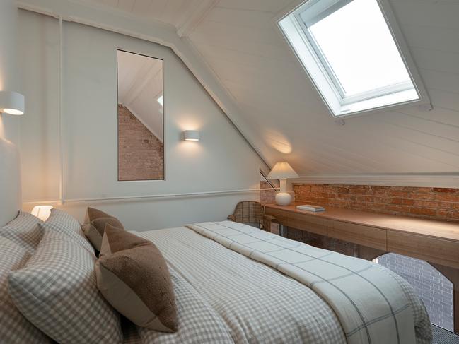 The Elizabeth’s main bedroom which includes a stylish neutral colour palette and super soft linens and wool throws. Picture: AARON JONES