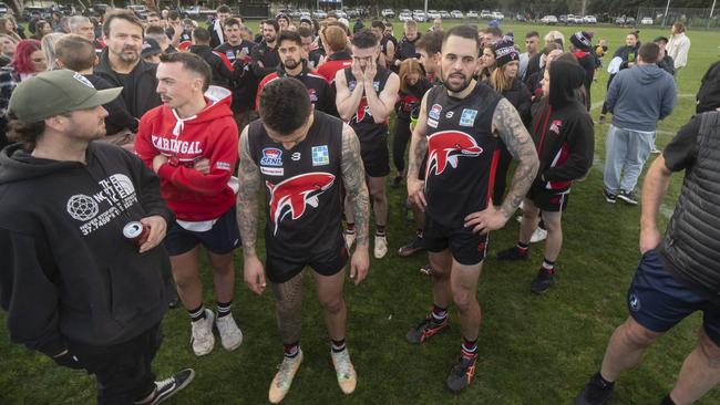 SFL: Dejected Frankston Dolphins players after the grand final. Picture: Valeriu Campan