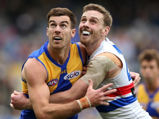 Jordan Roughead, right, rucks against former Eagle Scott Lycett.