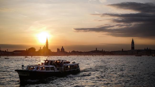 A tourist boat sails on the Gran Canal in Venice, Italy. Picture: AFP