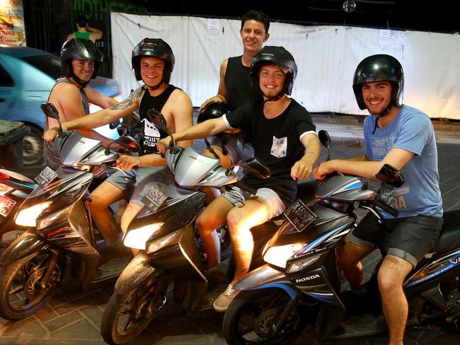 Australian tourists get on their bikes. Picture: Nathan Edwards