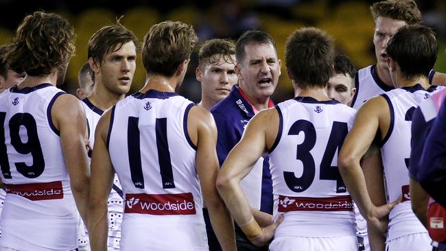 Fremantle coach Ross Lyon gives his players a spray at quarter time at Etihad Stadium.