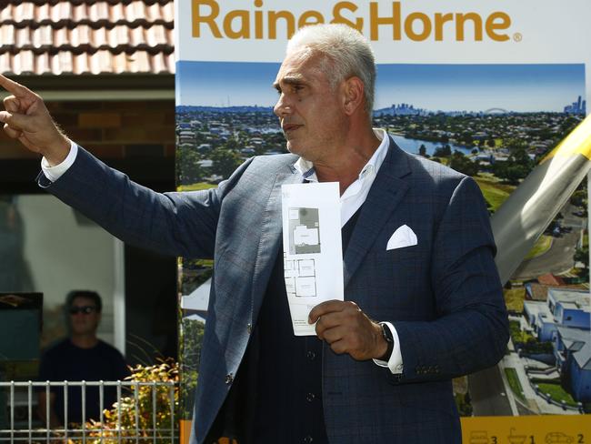 Tom Panos in his role as auctioneer. Picture: John Appleyard