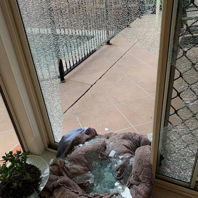 A plate-glass door smashed during the break-in. Picture: Supplied