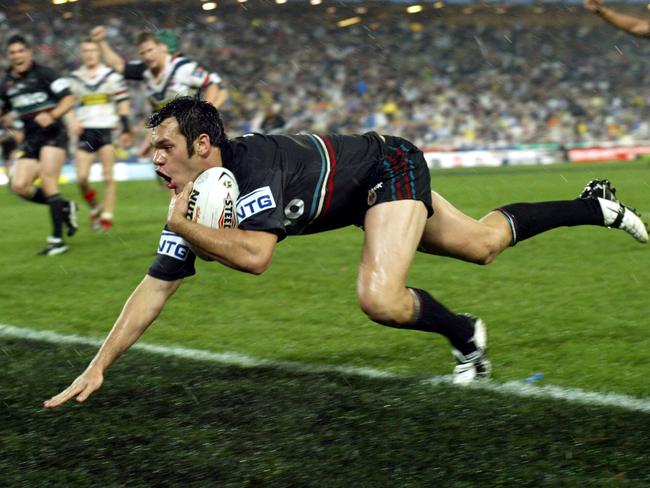 Luke Rooney dives over for the winning try in the 2003 grand final. Pic Mark Evans. Rugby League A/CT