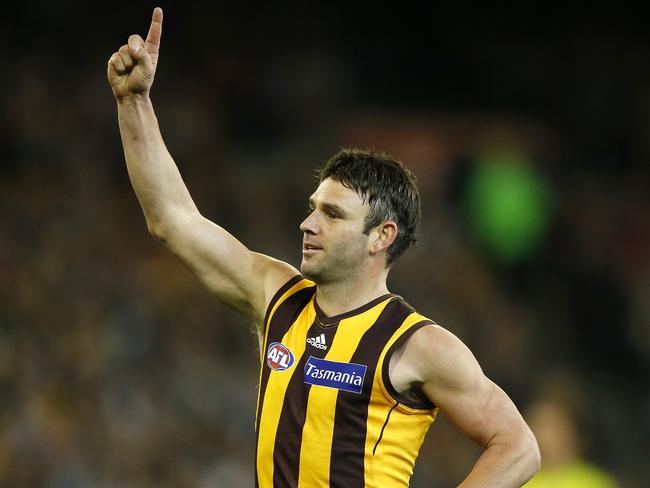 Brent Guerra celebrates after kicking a goal for Hawthorn in the 2013 preliminary final.