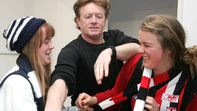 Ballarat’s Greg Packham tries to keep the peace between his twin daughters Lucy, left, and Sally, right, 17 in 2009. Picture: Alison Wynd