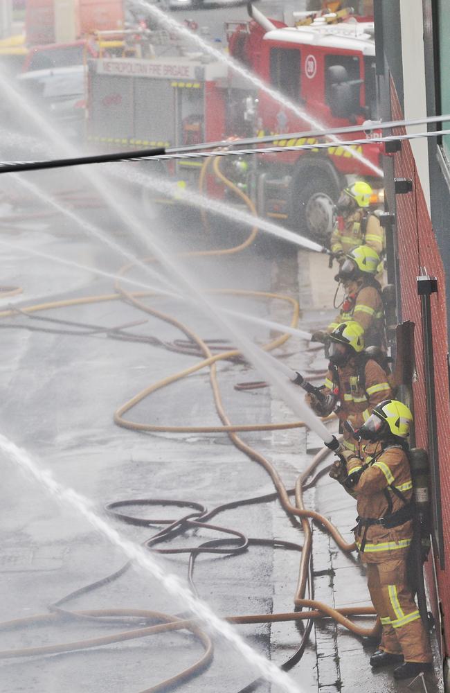 Fire crews battle the blaze. Picture: Hamish Blair