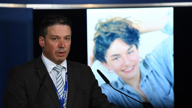 Detective Inspector Tim Day appeals for information with a picture of Sarah Gatt behind him on March 13, 2018, before Andrew Baker was charged with her murder. Picture: AAP Image/James Ross