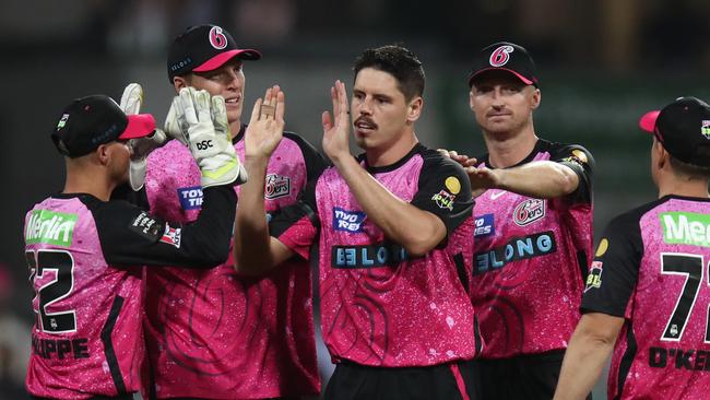 SYDNEY, AUSTRALIA - DECEMBER 08: Ben Dwarshuis of the Sixers celebrates after taking the wicket of Tom Rogers of the Renegades during the BBL match between Sydney Sixers and Melbourne Renegades at Sydney Cricket Ground on December 08, 2023 in Sydney, Australia. (Photo by Jason McCawley - CA/Cricket Australia via Getty Images)