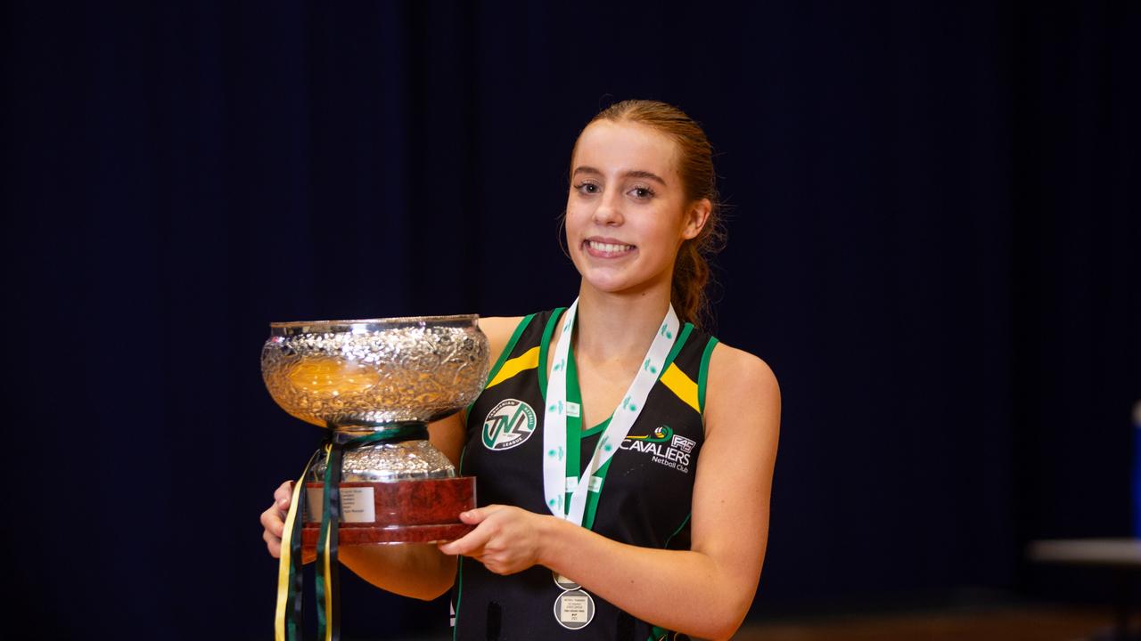 Cavliers centre and U19 grand final MVP Ava Lockwood-Roden with her medal and the premiership trophy at Launceston's Silverdome after defeating Cripps. Picture: PATRICK GEE/SUPPLIED