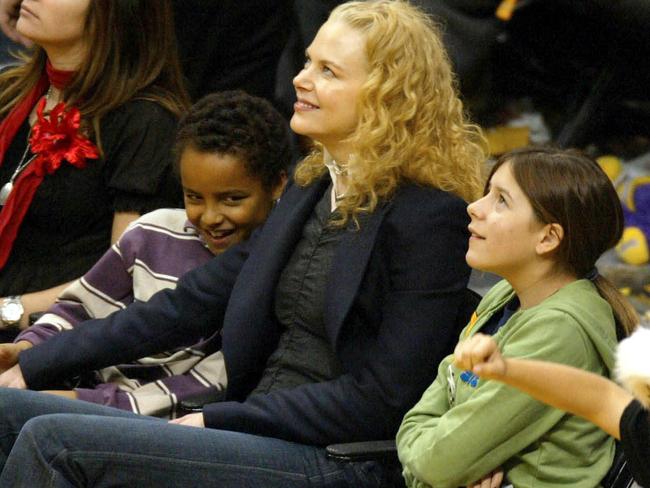 Nicole Kidman watches a Lakers basketball game with her children Connor and Isabella in 2004. Picture: AFP/Getty Images