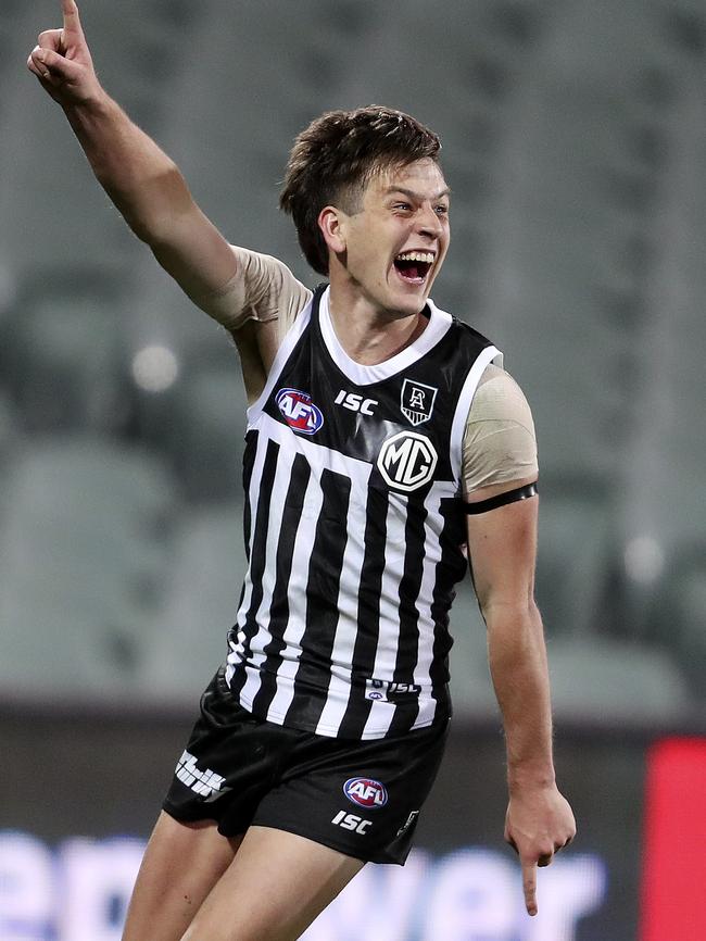 Zak Butters celebrates in the club’s traditional guernsey. Picture: Sarah Reed