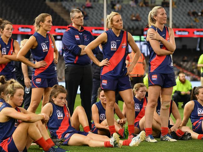 Dejected Diamond Creek players after losing to Darbin Falcons during the VFL Women's Grand Final at Etihad Stadium in Docklands, Sunday, Sept. 24, 2017. (Picture/Andy Brownbill