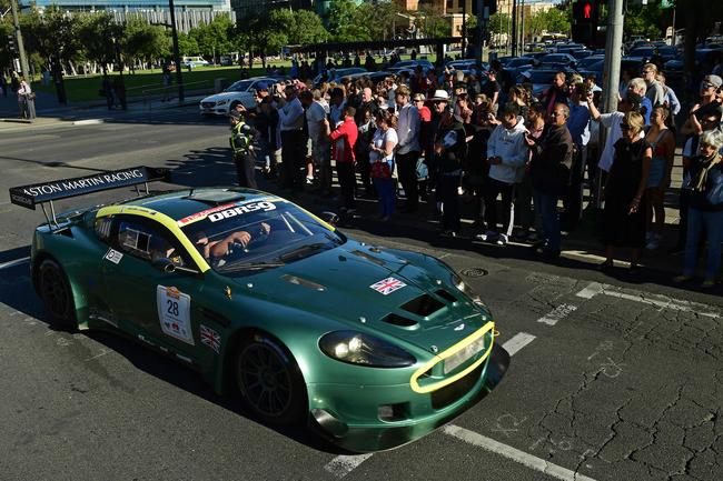 Race cars head down Wakefield Street through Victoria Square for the Adelaide Motorsport Festival’s Peak Hour of Power. Picture: Tom Huntley