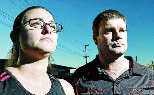 Lismore residents Carmilla and Kris Hoggan are upset over rising council rates and charges. . Picture: Jerad Williams