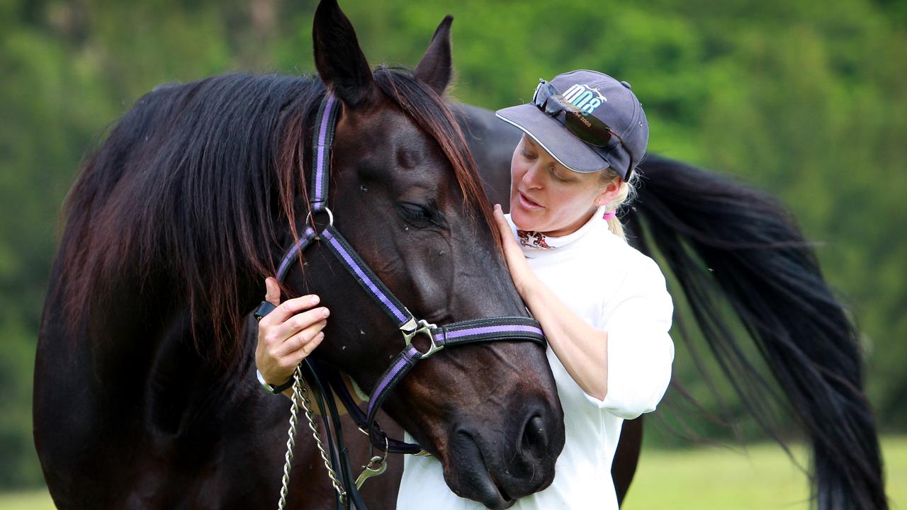 Trainer driver Natalie Rasmussen with pacer and Miracle Mile runner Blacks A Fake, at Albion Park track near Wollongong.