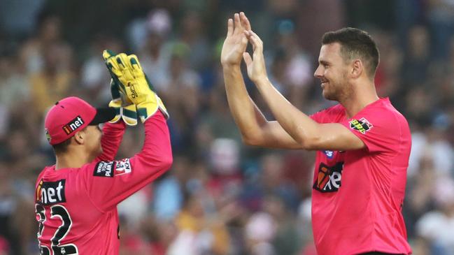 Josh Hazlewood of the Sixers celebrates the wicket of Alex Carey. Picture: AAP Image/Jason O'Brien