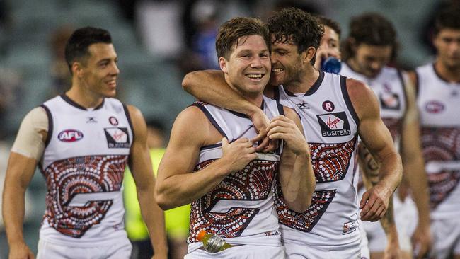 The Giants celebrate their win over the Eagles on Sunday.Picture: AAP