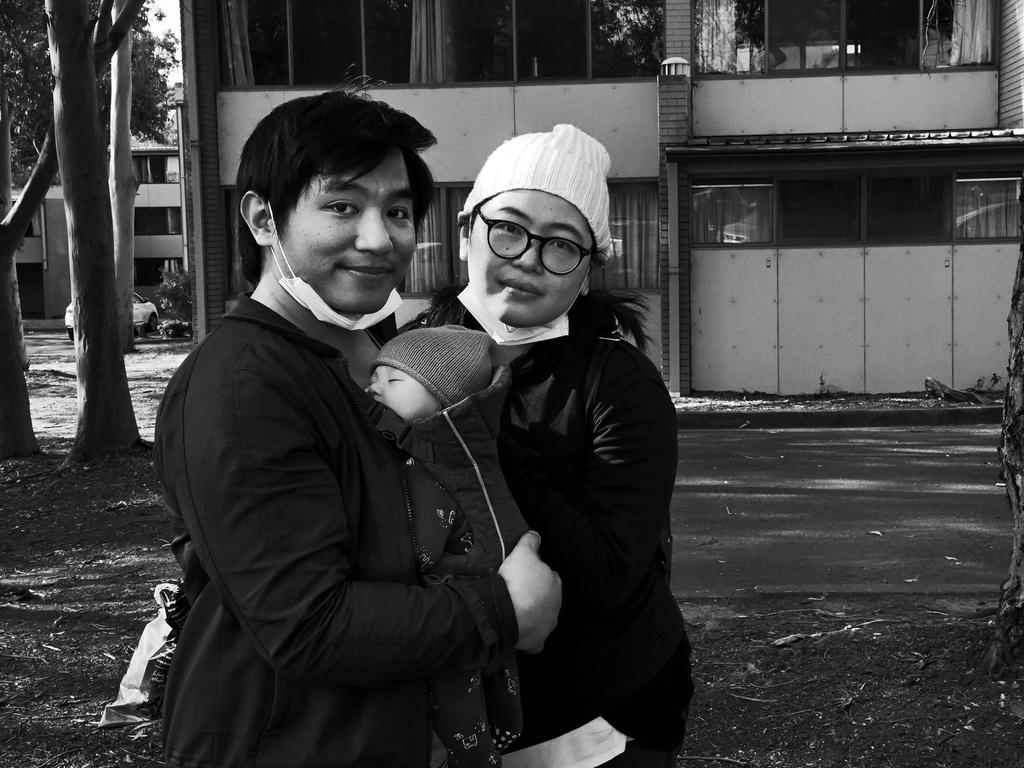 FACES OF LOCKDOWN: John, 37 and Emily, 35, of Westmead and their three-month-old baby Ethan. John is a software developer and Emily is an accountant on maternity leave. Photo: Jeremy Piper