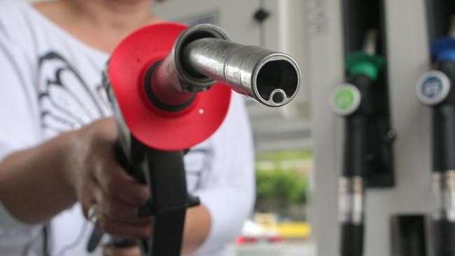 Motorist Nada Bradas uses the new vapour safe bowsers, introduced by Caltex Oil Company that stop petrol vapours escaping into the environment, at her local Caltex service station at Manly in Sydney.