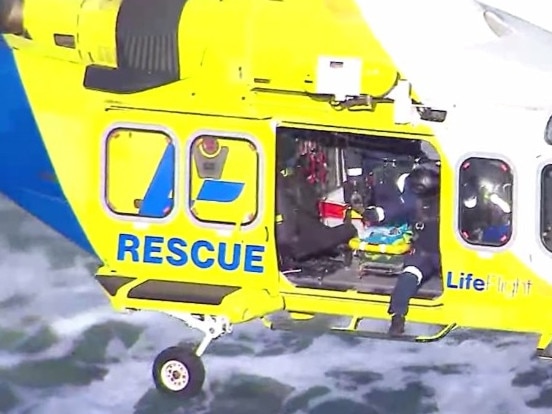 Sunshine Coast-based LifeFlight aeromedical crew winched a paraglider to safety on Sunday afternoon after a mid-air collision. Picture: LifeFlight