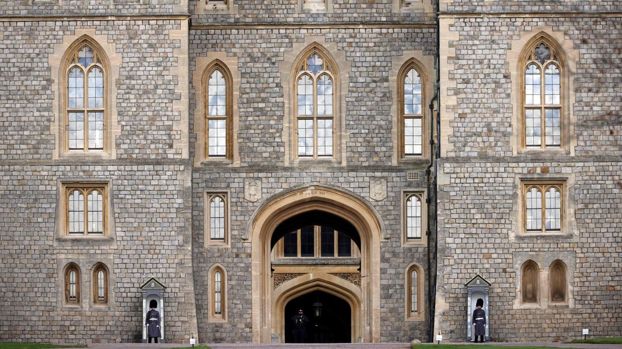 Windsor Castle guards stand in their sentry box at an entrance to Windsor Castle. Picture: ADRIAN DENNIS / AFP