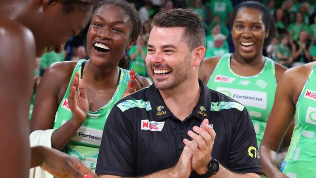 PERTH, AUSTRALIA - MAY 10: Dan Ryan, Coach of the Fever shares a laugh with the team during the round five Super Netball match between West Coast Fever and Queensland Firebirds at RAC Arena, on May 10, 2024, in Perth, Australia. (Photo by James Worsfold/Getty Images)