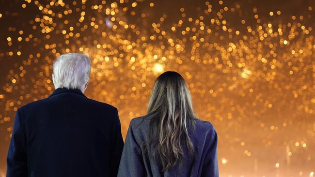 Donald and Melania Trump watch fireworks at Trump National Golf Club Washington DC. Picture: AFP