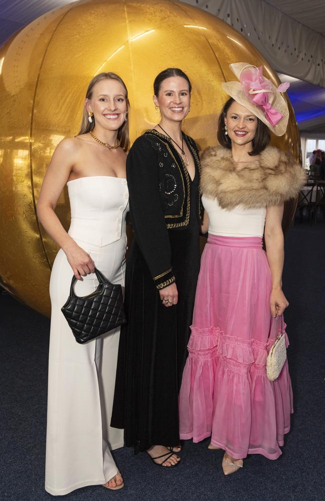 At the Emergency Services race day are (from left) Abbey Godwin-Smith, Elizabeth Grimmond and Renee Loxley at Clifford Park, Saturday, August 10, 2024. Picture: Kevin Farmer