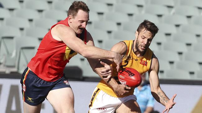 Aidan Riley and Shane Nelson battle for possession during the SANFL v WAFL State game curtain raiser to Showdown 44. Picture Sarah Reed