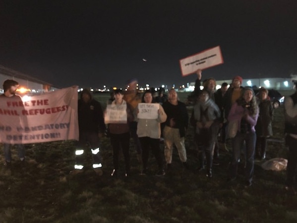 Supporters gathered near the hangar to protest the family’s removal. Pic: Refugee Action Collective