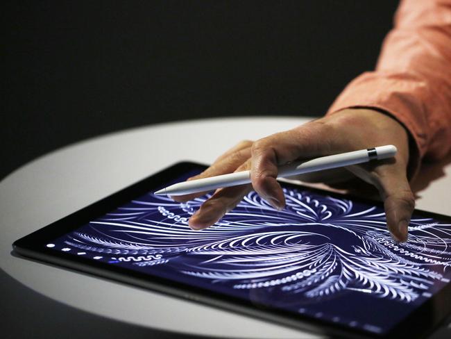 SAN FRANCISCO, CA - SEPTEMBER 9: A man uses the new Apple Pencil on an iPad Pro after an Apple special event at Bill Graham Civic Auditorium September 9, 2015 in San Francisco, California. Apple Inc. unveiled latest iterations of its smart phone, forecasted to be the 6S and 6S Plus and announced an update to its Apple TV set-top box. Stephen Lam/ Getty Images/AFP == FOR NEWSPAPERS, INTERNET, TELCOS & TELEVISION USE ONLY ==